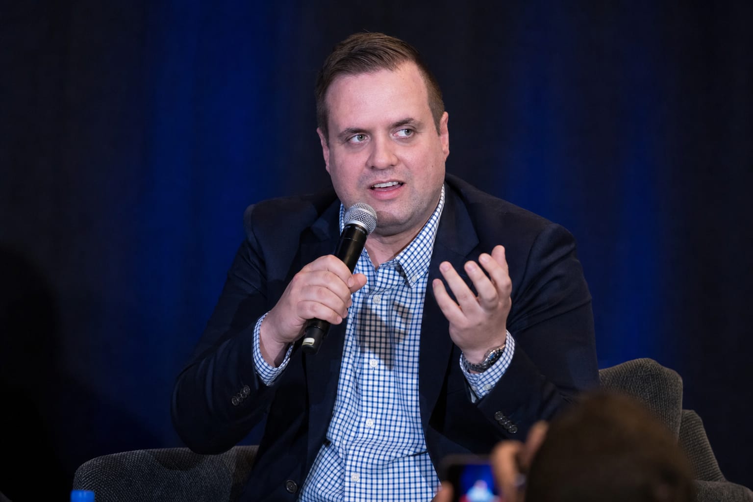 Brandon from Defy IT speaking at a business technology event