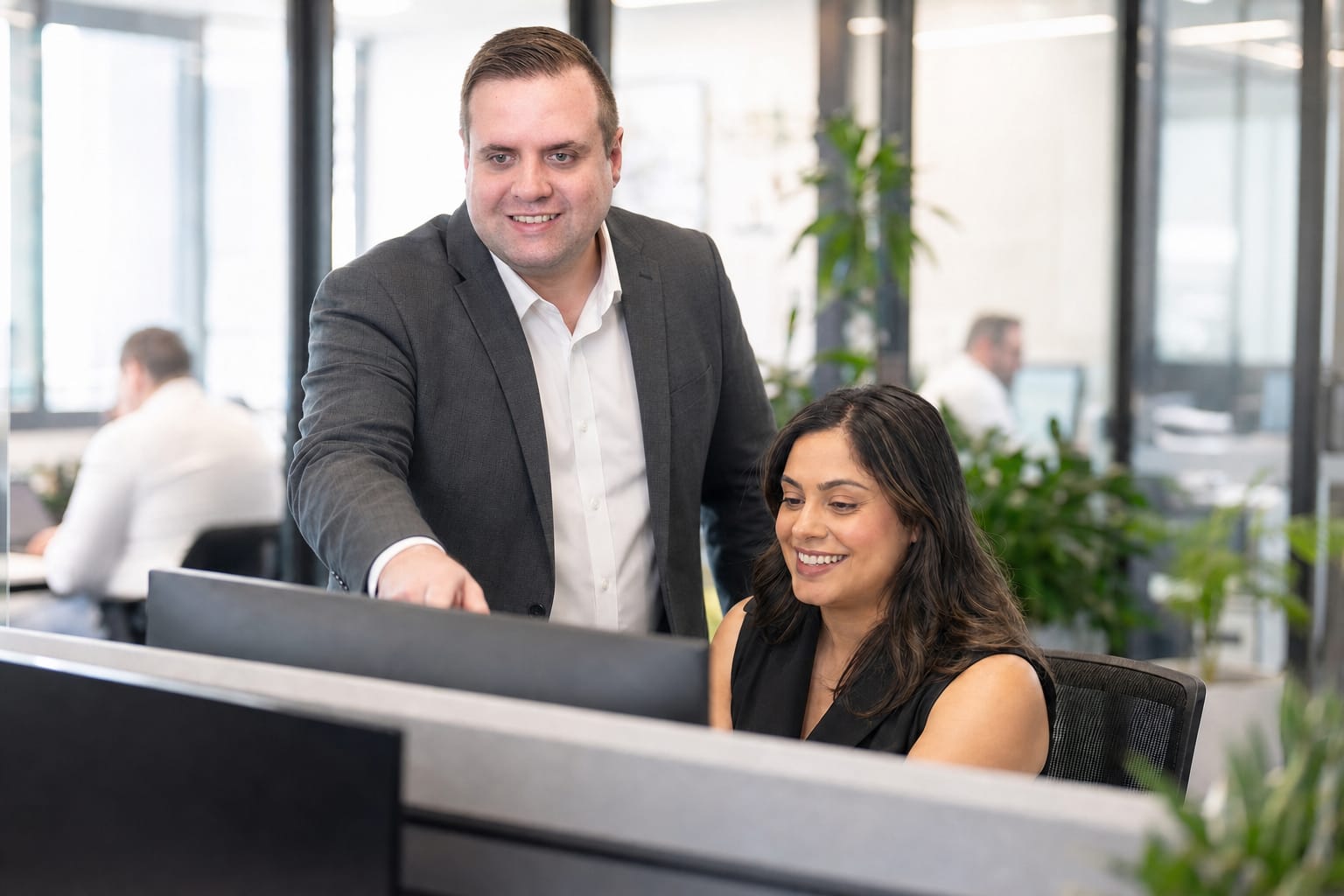Brandon from Defy IT helping staff at their workstations